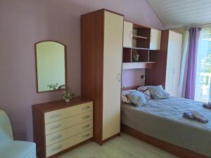 Postel nebo postele na pokoji v ubytování Apartments Mig