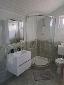 Koupelna v ubytování Apartments Mig