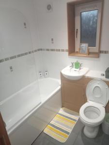 Koupelna v ubytování Family friendly apartment