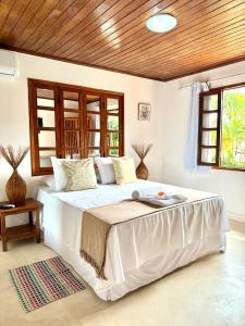 Postel nebo postele na pokoji v ubytování Machê Pousada & Boutique - A mais charmosa de Arraial D ajuda