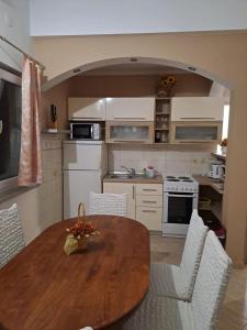 Kuchyň nebo kuchyňský kout v ubytování Apartments Mig