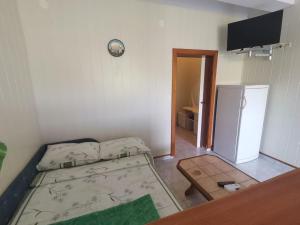 Postel nebo postele na pokoji v ubytování Apartments Mig