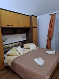 Postel nebo postele na pokoji v ubytování Apartments Mig