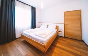 Ліжко або ліжка в номері Aktivhotel Wildschütz