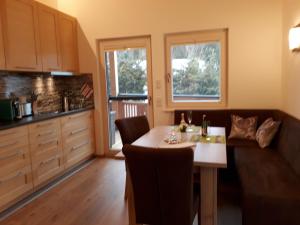 Kuchyň nebo kuchyňský kout v ubytování Apartchalet Sisi- including Saalfelden Leogang Card