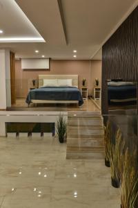 Postel nebo postele na pokoji v ubytování Level 1 Spa Apartman