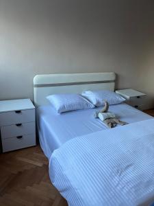 Postel nebo postele na pokoji v ubytování Apartment Vračar Nikšić