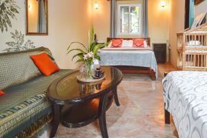 Rúm í herbergi á Hotel Anachoreo