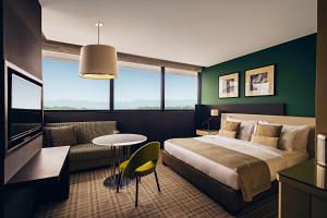 Cama ou camas em um quarto em Crowne Plaza Geneva by IHG