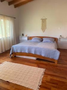 Postel nebo postele na pokoji v ubytování Casa Cabaña en San Bernardino