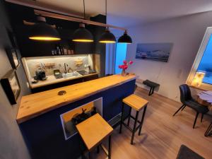 Kuchyň nebo kuchyňský kout v ubytování Modern-gemütliche FeWo mit Sauna