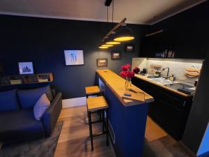 Posezení v ubytování Modern-gemütliche FeWo mit Sauna