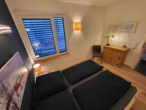 Posezení v ubytování Modern-gemütliche FeWo mit Sauna