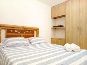 Postel nebo postele na pokoji v ubytování Apartamento 2 Dormitorios - Aviva Sierra