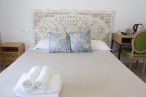 Hotel CALPE客房内的一张或多张床位