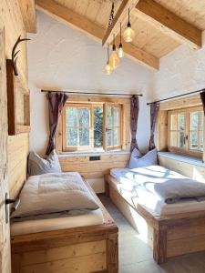 Postel nebo postele na pokoji v ubytování Chalet am Bachl 2