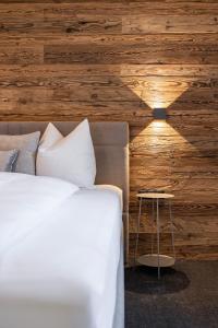Giường trong phòng chung tại Apart Scheiber