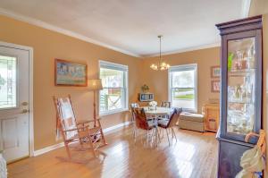 a dining room with a table and chairs at 1 Mi to KFC Museum Corbin Getaway! in Corbin