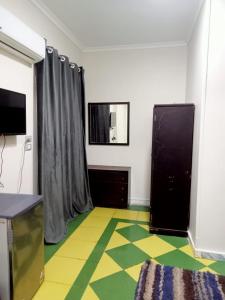 TV a/nebo společenská místnost v ubytování Eljoker pyramids hostel