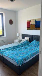 Ένα ή περισσότερα κρεβάτια σε δωμάτιο στο Luxury Apartment Eszter