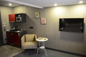 A television and/or entertainment centre at Cityloft 24