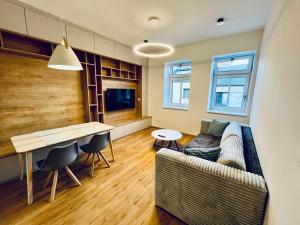 TV a/nebo společenská místnost v ubytování Fresh Apartments