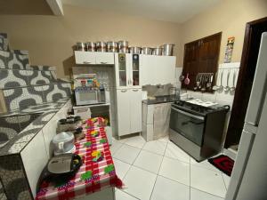 Kuchyň nebo kuchyňský kout v ubytování Pousada Da Lú