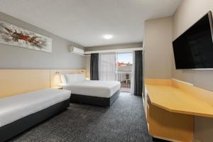 Postel nebo postele na pokoji v ubytování Best Western Hobart