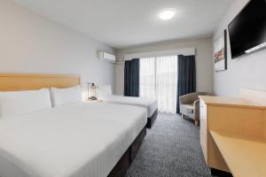 Postel nebo postele na pokoji v ubytování Best Western Hobart