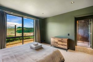 Ένα ή περισσότερα κρεβάτια σε δωμάτιο στο Mountain Serenity Retreat