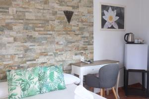 Posezení v ubytování Hostal La Paloma II