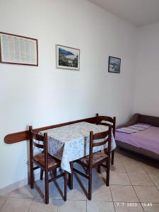 Postel nebo postele na pokoji v ubytování Apartment Slaven