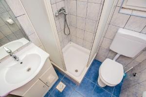 Kúpeľňa v ubytovaní Apartment Kreso + 18 fotografií