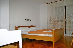 Posteľ alebo postele v izbe v ubytovaní Apartments Jere