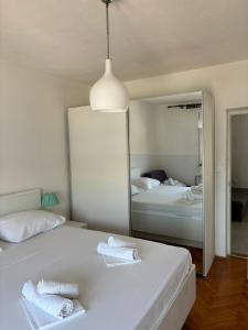Posteľ alebo postele v izbe v ubytovaní Apartments Jere