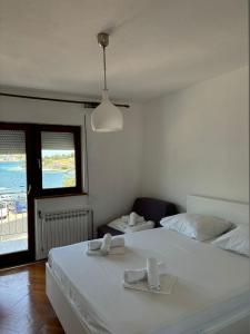 Posteľ alebo postele v izbe v ubytovaní Apartments Jere
