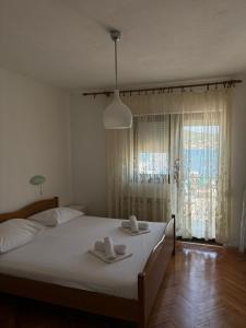Posteľ alebo postele v izbe v ubytovaní Apartments Jere