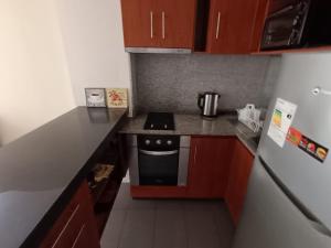 Kuchyň nebo kuchyňský kout v ubytování lindo depto en Concón con excelente ubicación