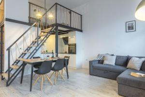 Posedenie v ubytovaní Apartament z antresolą Nowa Papiernia