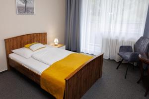 Rúm í herbergi á Hotel FIT