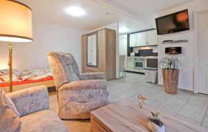 Kuchyň nebo kuchyňský kout v ubytování Ferienwohnung Hohen Sprenz