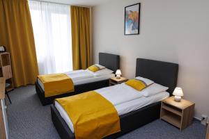 Rúm í herbergi á Hotel FIT