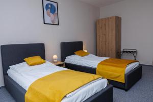 Rúm í herbergi á Hotel FIT