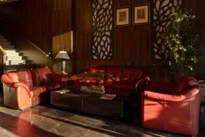 A seating area at Classes Hotel Airport