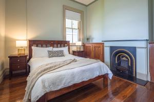 Postel nebo postele na pokoji v ubytování Barunguba Montague Island