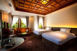 Postel nebo postele na pokoji v ubytování Hotel Utano Kyoto Besho