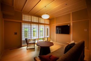TV a/nebo společenská místnost v ubytování Hotel Utano Kyoto Besho