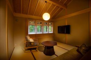 TV a/nebo společenská místnost v ubytování Hotel Utano Kyoto Besho