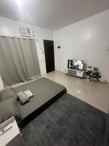 Ruang duduk di Yna C Guesthouse