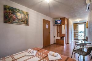 Postel nebo postele na pokoji v ubytování Apartment and Rooms Aračić